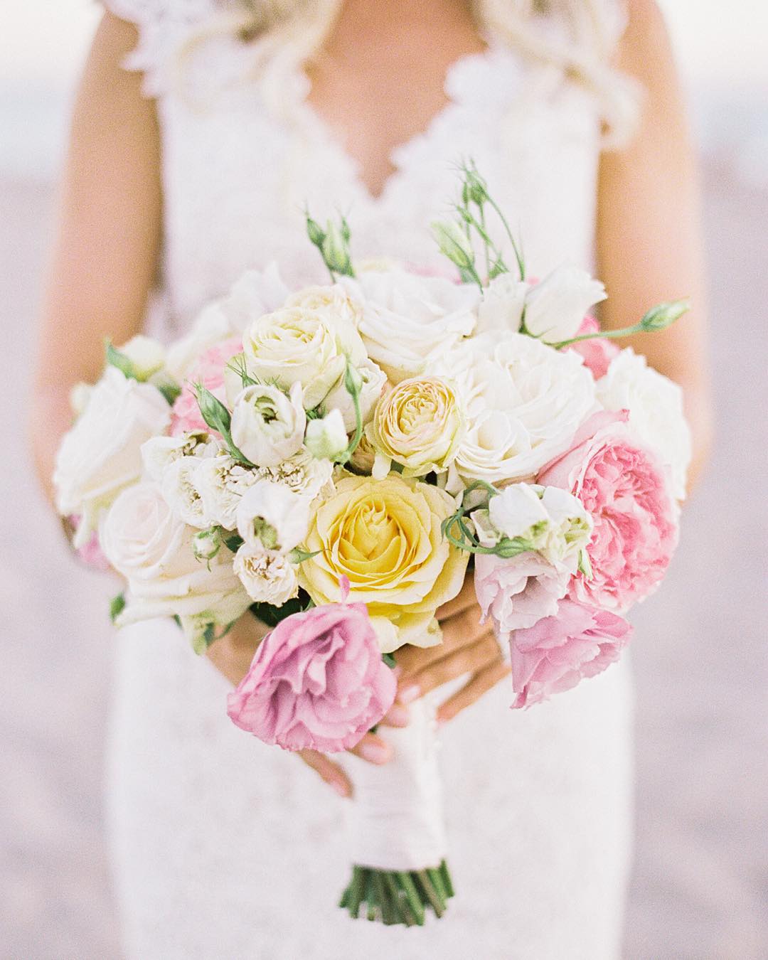 A new favorite from one of the most lively weddings this summer. Such a beautiful bouquet from Ella & Louie. Photo by Grace Kathryn