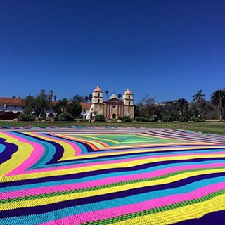 Shot of my guinness world record attempt for the largest crocheted granny square when it was laid out in the Rose Garden across from the Mission in Santa Barbara. 