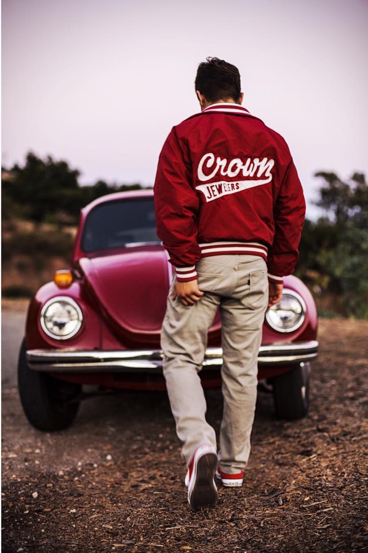 Dylan in front of Red VW Beetle.Photo by Tate Larrick