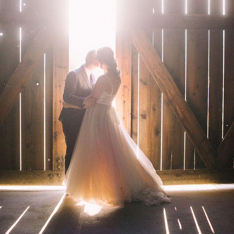 These gorgeous barn doors at Santa Margarita Ranch are the perfect complement to the late afternoon sunlight . Photo by Grace Kathryn