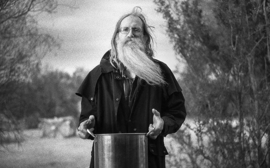 The community at Slab City often hosts a free dinner made from donated food. This man was on dish duty. Photo by Nick Korompilas